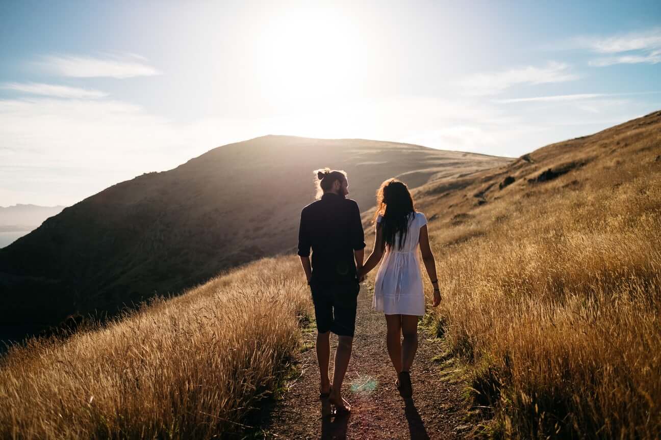 Couple holding hands